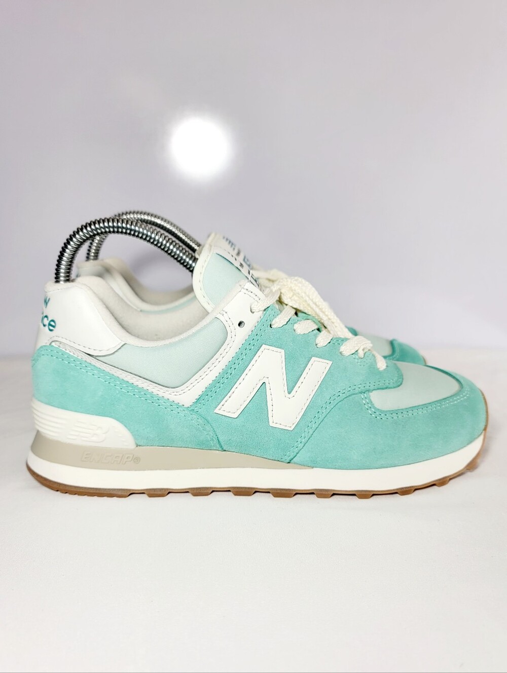 New Balance 574 Men Size 7 / Women Size 8.5 low top sneaker's.